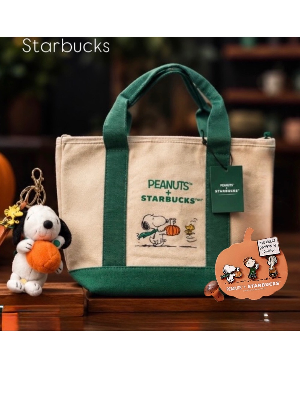 The limited-edition Peanuts™ + Starbucks® Snoopy Tote, Bag Charm and Pin Set